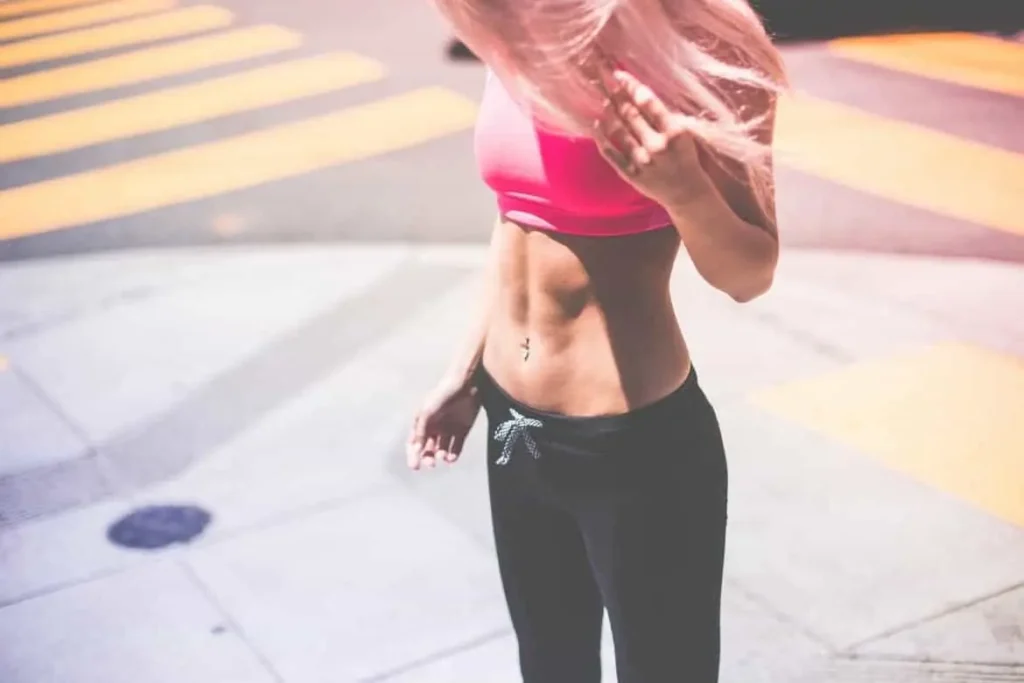 Woman with toned stomach after LA-EMS Body Sculpting Treatment Ilford